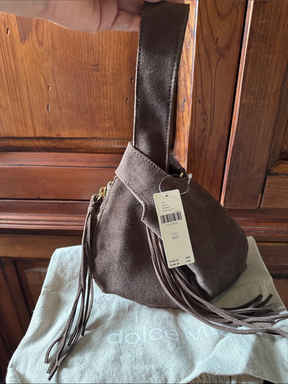 NWT CHOCOLATE BROWN SUEDE ZURY BAG.
CROSSBODY STRAP AND DUSTBAG INCLUDED
